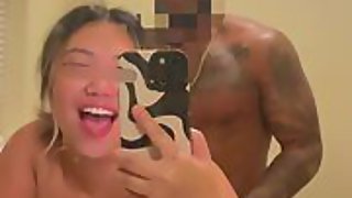 Hot Asian Slut taking selfie video in bathroom